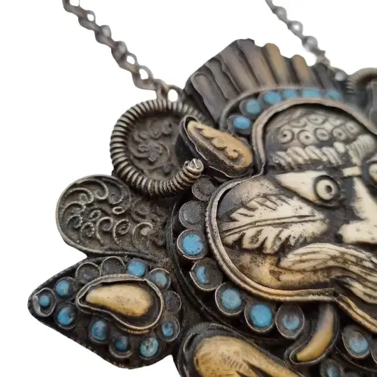 Tibetan nepal carved zeeba necklace, amulet with turquoises, kirtimukha.