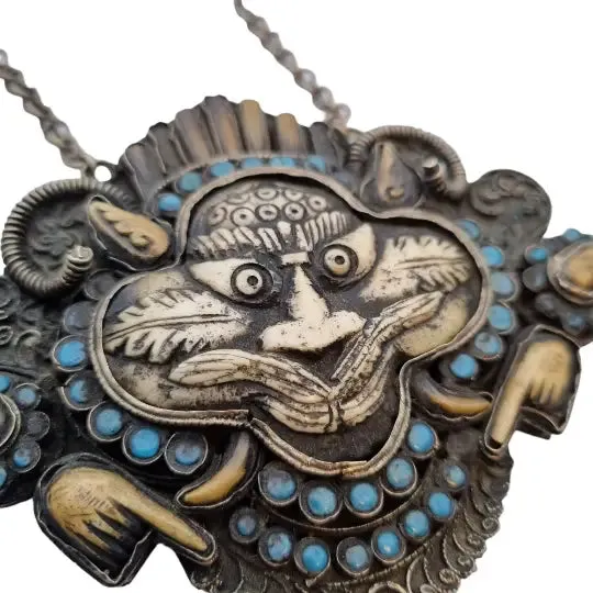 Tibetan nepal carved zeeba necklace, amulet with turquoises, kirtimukha.